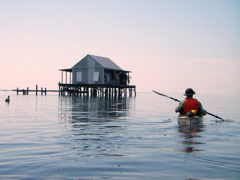 Kayaking near fish house